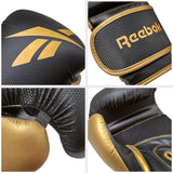 CONJUNTO DE LUVAS DE BOXE E SACO DE PANCADAS REEBOK 4FT - PRETO/OURO (RSCB-13105GB)